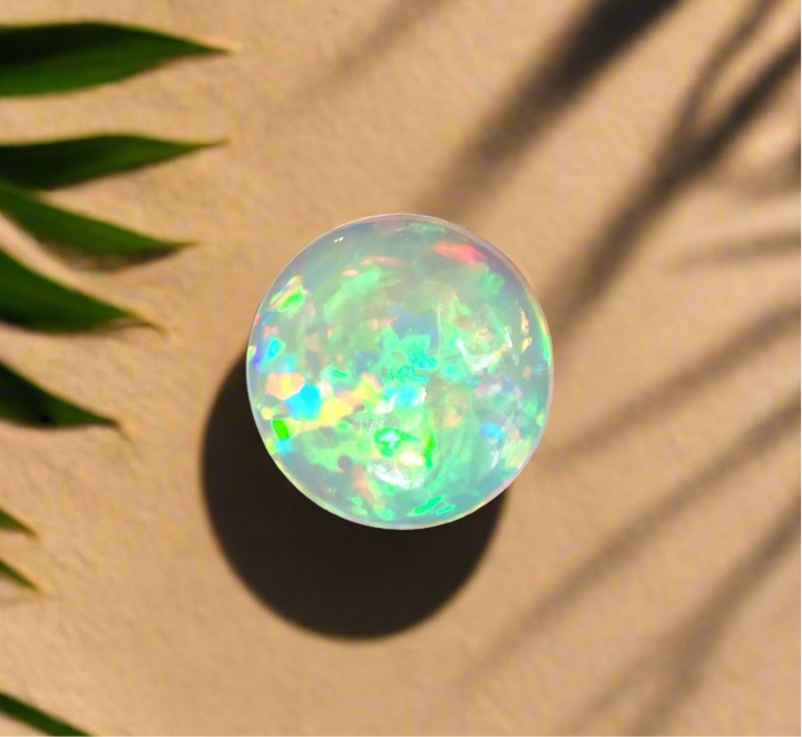 Ethiopian Welo Opal, 15.65 ct. Round Cab, High Dome, Flagstone Pattern AI background used but stone is actual image.