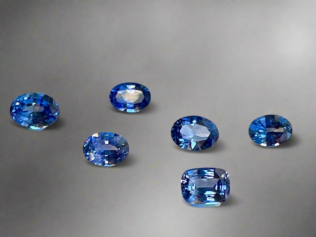 Ceylon sapphire parcel of 6 7.15 tow 5 oval 1 cushion. Eye clean, royal blue 