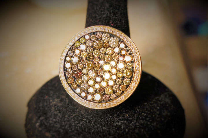 Pink, champagne, cognac, yellow, orange diamond ring.