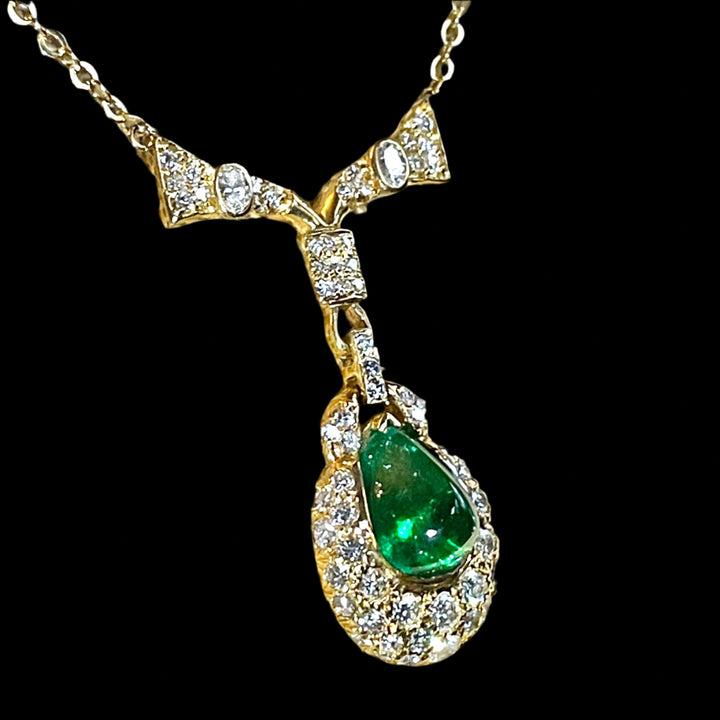 5.56 ct. Emerald Cabochon Pendant - Necklace in 18k Yellow Gold and 2 carats Of Round VS-G Or Better Diamond on 18k Gold Chain.