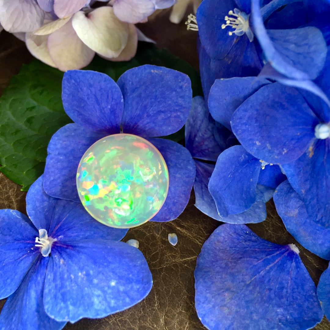 Crystal Opal, 15.65 ct. Round Cab, High Dome, Flagstone Pattern and Puzzle Piece pattern. 