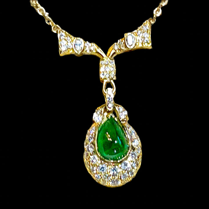 5.56 ct. Emerald Cabochon Pendant - Necklace in 18k Yellow Gold and 2 carats Of Round VS-G Or Better Diamond on 18k Gold Chain.