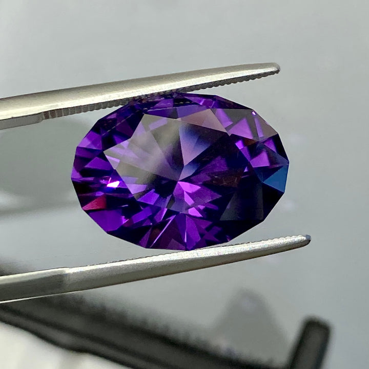 9.44 carat Amethyst, Uruguay, Red Flash, Flawless, Rare In This Quality Cushion Cut Oval