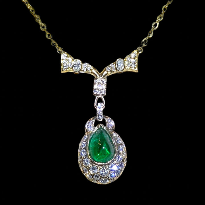 5.56 ct. Emerald Cabochon Pendant - Necklace in 18k Yellow Gold and 2 carats Of Round VS-G Or Better Diamond on 18k Gold Chain.