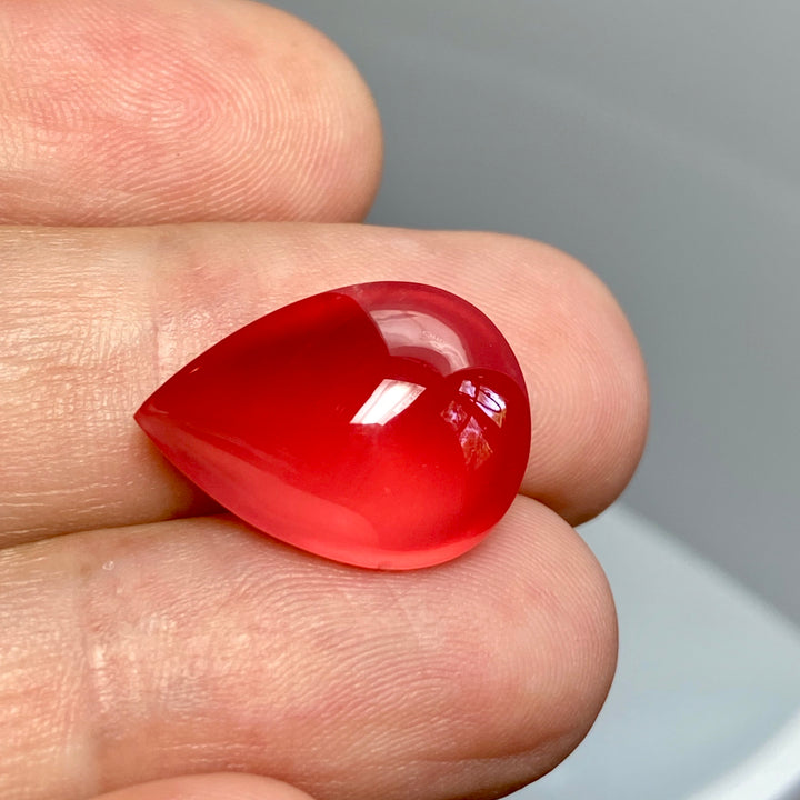 Rhodochrosite Cabochon, 14.92 ct. Translucent, Tear drop. Highly polished, Top Grade.