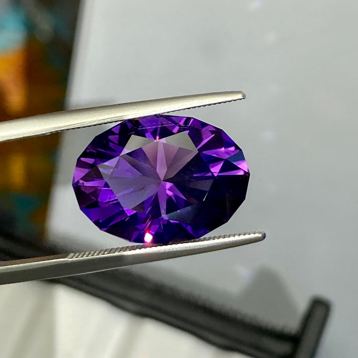 9.44 carat Amethyst, Uruguay, Red Flash, Flawless, Rare In This Quality Cushion Cut Oval