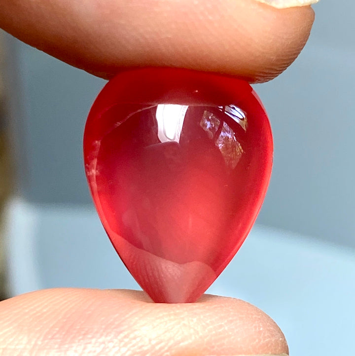 Rhodochrosite Cabochon, 14.92 ct. Translucent, Tear drop. Highly polished, Top Grade.