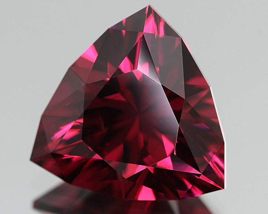 Malaya Garnet, 6.1 ct. Pyralspite, Color-Shift, Master Cut in USA, Trillion, Calibrated, Malaia