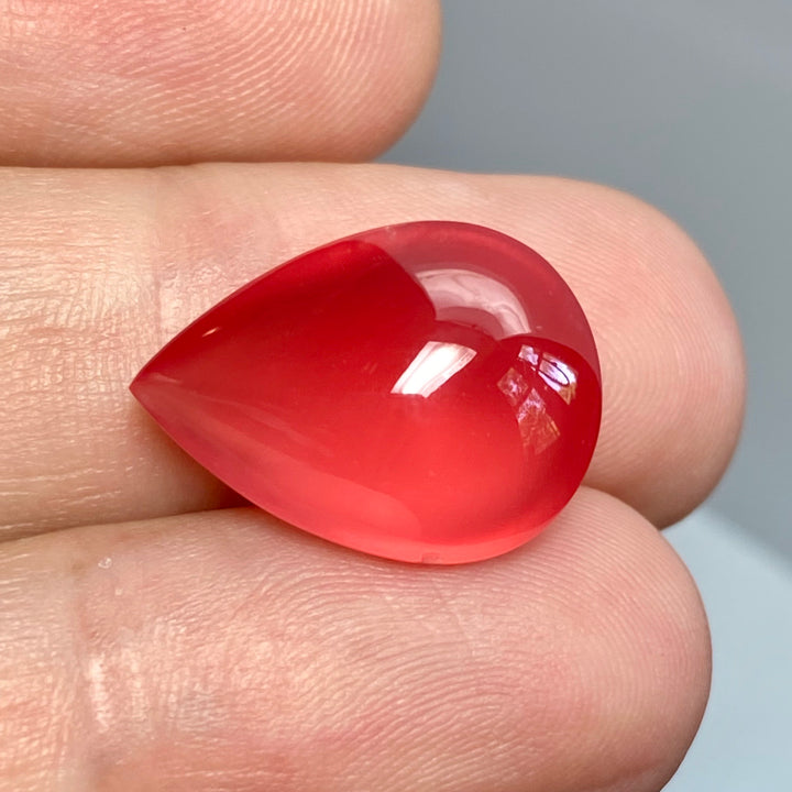 Rhodochrosite Cabochon, 14.92 ct. Translucent, Tear drop. Highly polished, Top Grade.