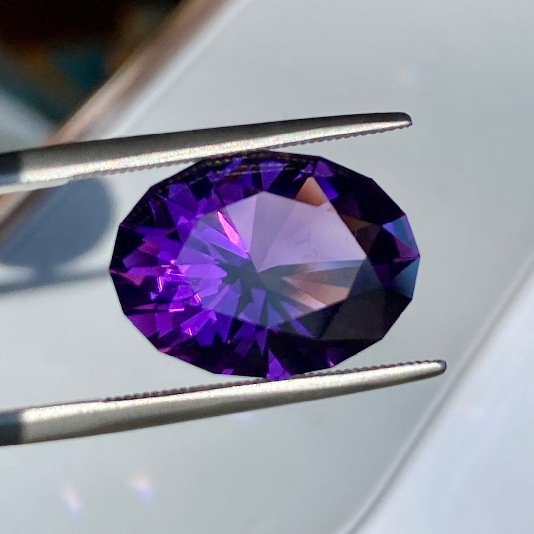 9.44 carat Amethyst, Uruguay, Red Flash, Flawless, Rare In This Quality Cushion Cut Oval